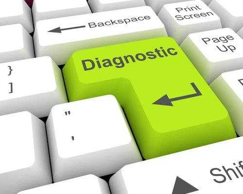 computer keyboard with green diagnostic key
